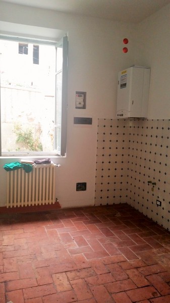 Ingrandisci la foto