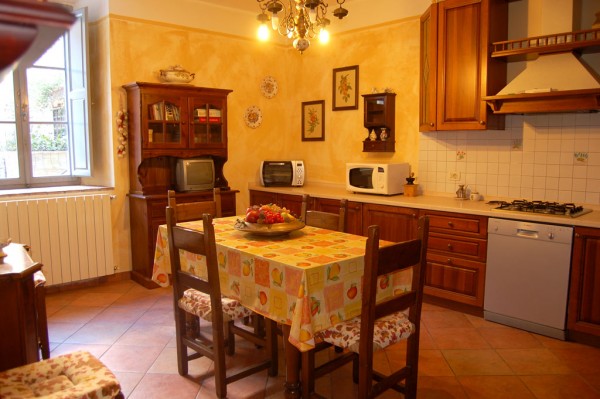 Ingrandisci la foto