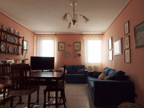 Ingrandisci la foto