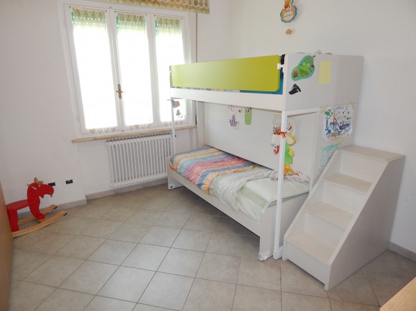 Ingrandisci la foto