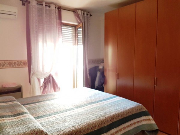 Ingrandisci la foto
