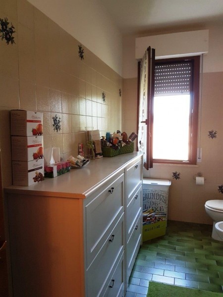 Ingrandisci la foto
