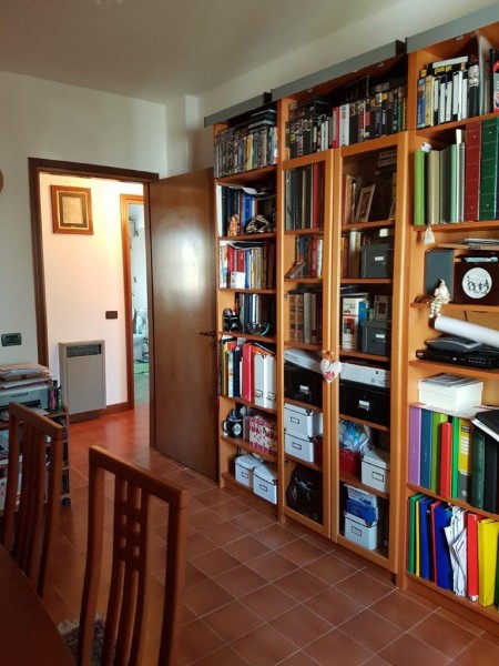 Ingrandisci la foto