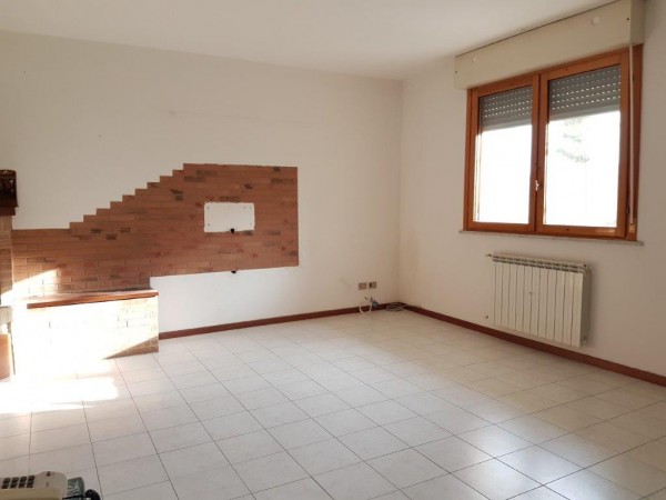 Ingrandisci la foto