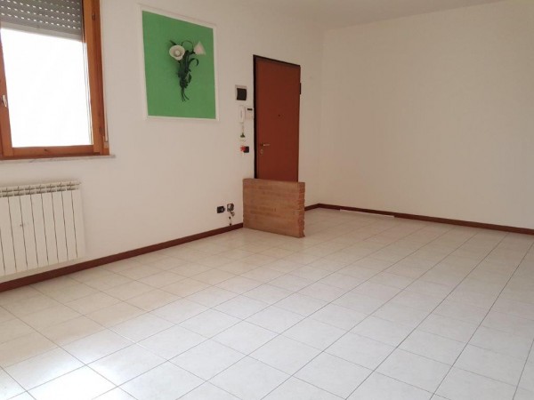 Ingrandisci la foto