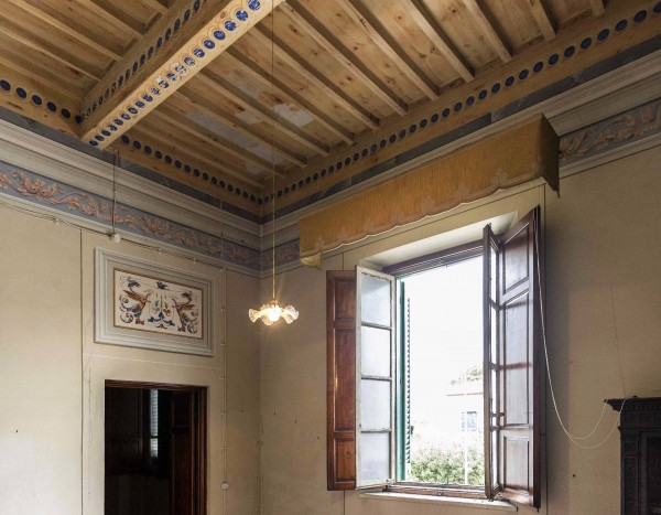 Ingrandisci la foto