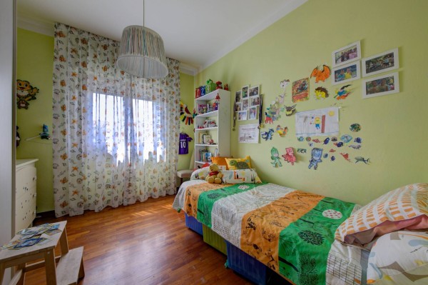 Ingrandisci la foto