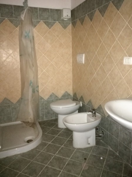 Ingrandisci la foto