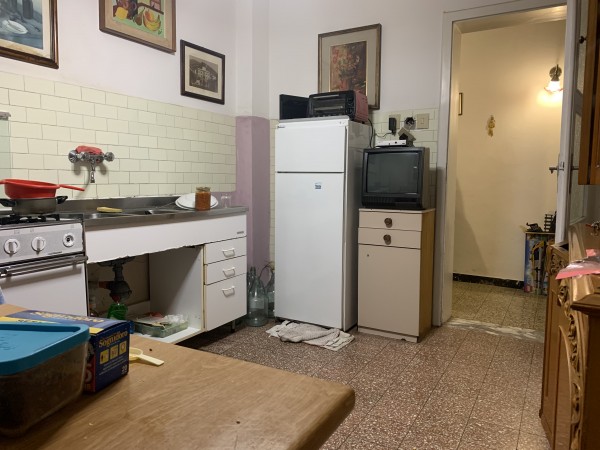 Ingrandisci la foto