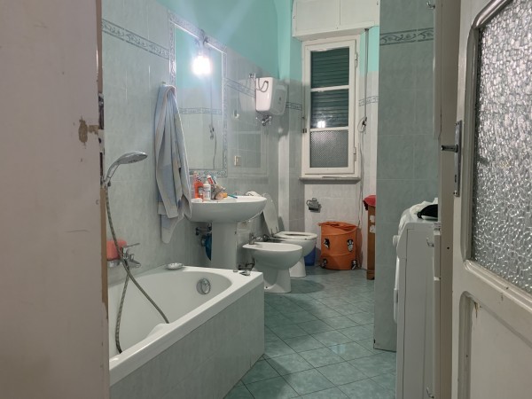 Ingrandisci la foto