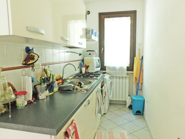Ingrandisci la foto