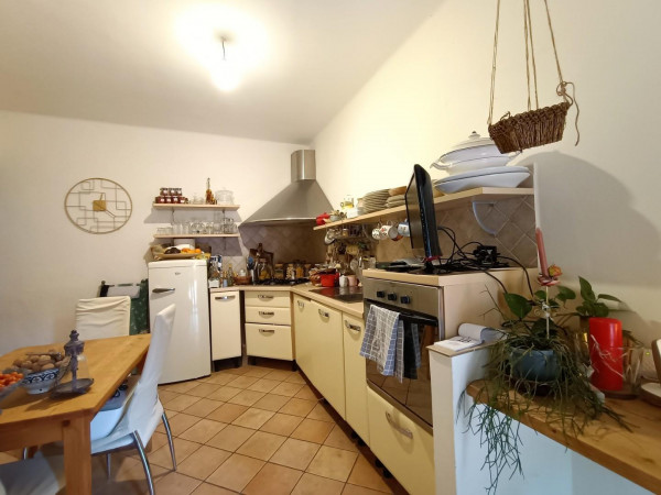 Ingrandisci la foto
