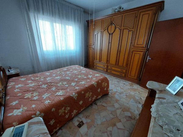 Ingrandisci la foto