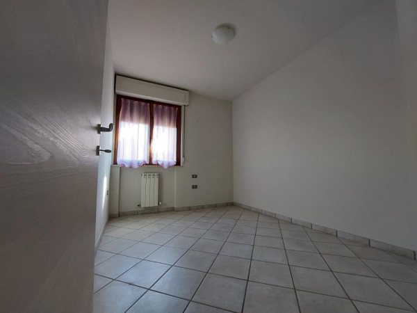 Ingrandisci la foto