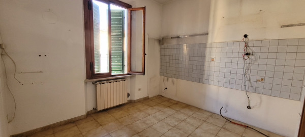 Ingrandisci la foto