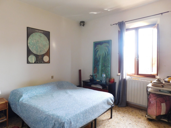 Ingrandisci la foto