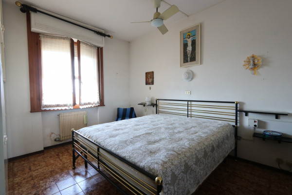 Ingrandisci la foto