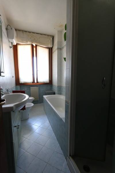 Ingrandisci la foto