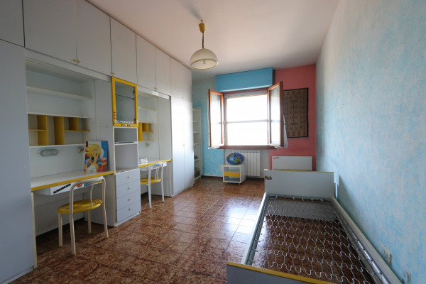 Ingrandisci la foto