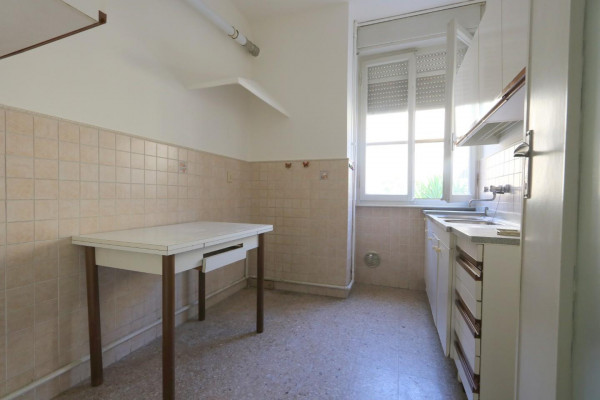 Ingrandisci la foto