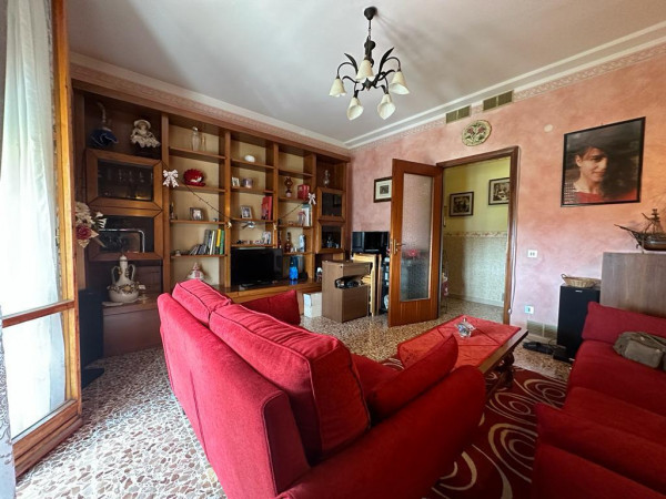 Ingrandisci la foto