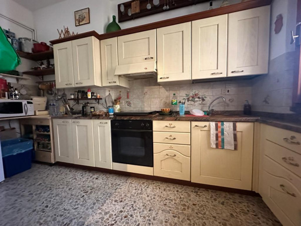 Ingrandisci la foto
