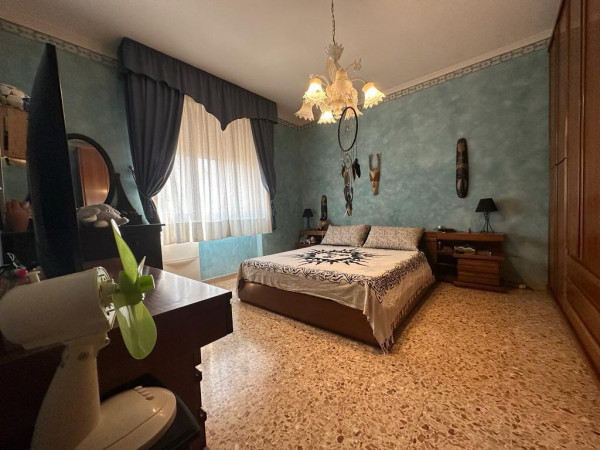 Ingrandisci la foto