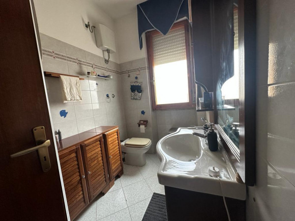 Ingrandisci la foto