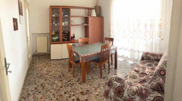 Ingrandisci la foto