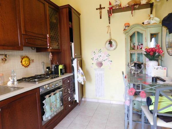 Ingrandisci la foto