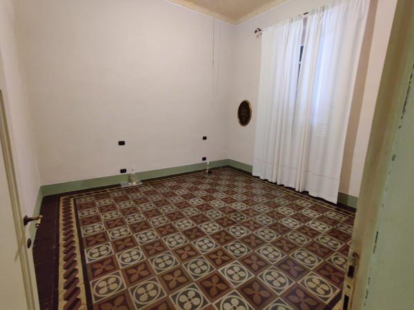 Ingrandisci la foto