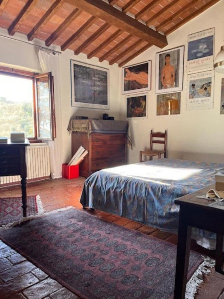 Ingrandisci la foto