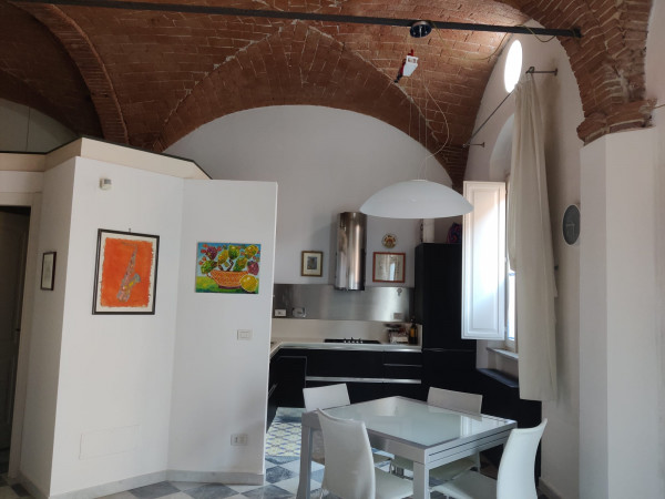 Ingrandisci la foto