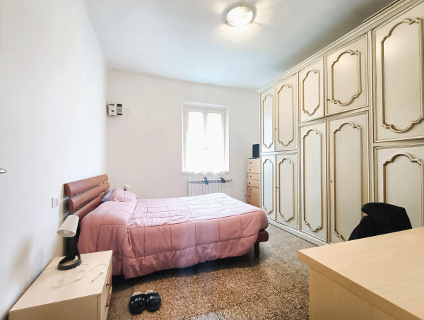 Ingrandisci la foto