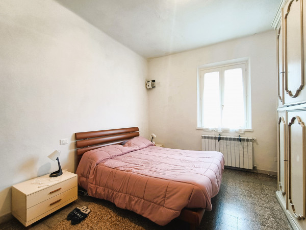Ingrandisci la foto