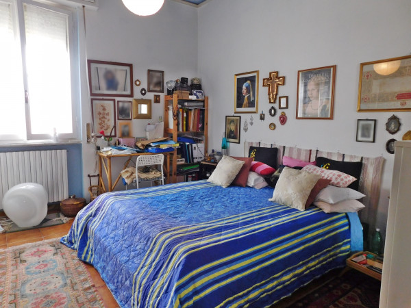 Ingrandisci la foto