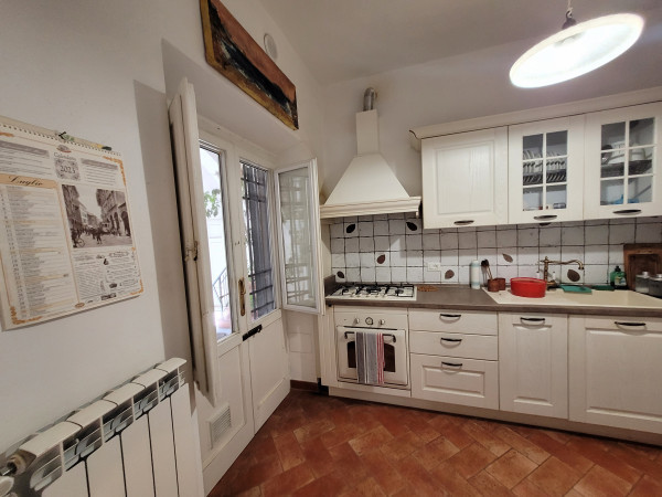 Ingrandisci la foto