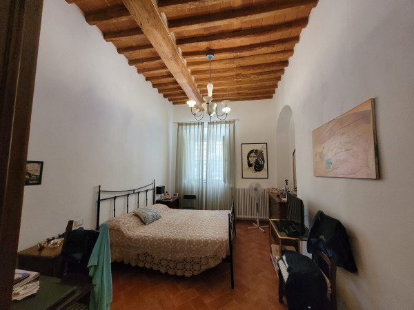 Ingrandisci la foto