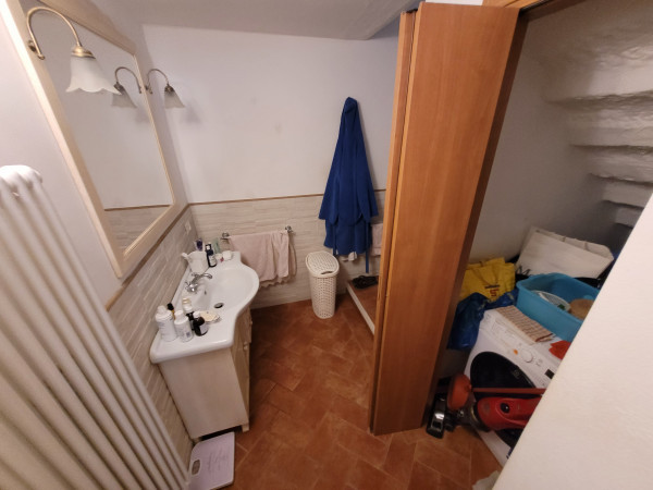 Ingrandisci la foto