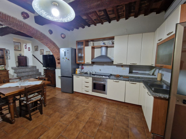 Ingrandisci la foto