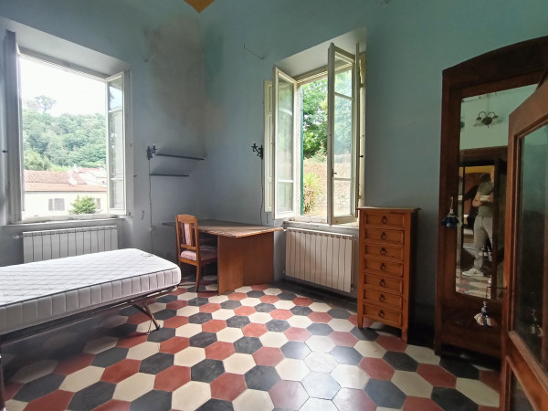 Ingrandisci la foto