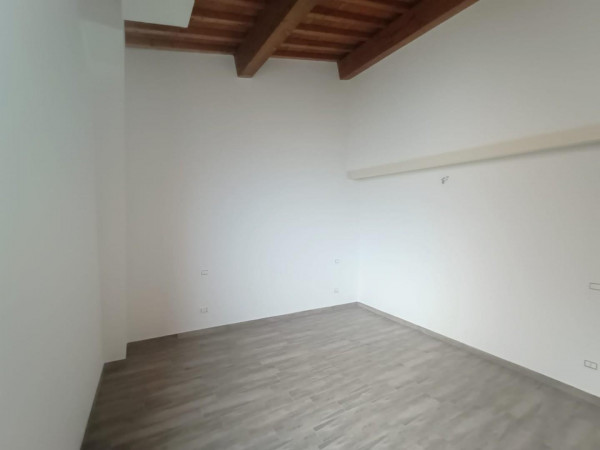 Ingrandisci la foto