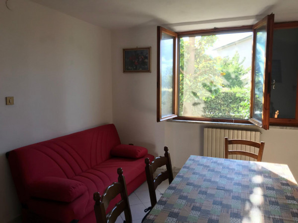 Ingrandisci la foto