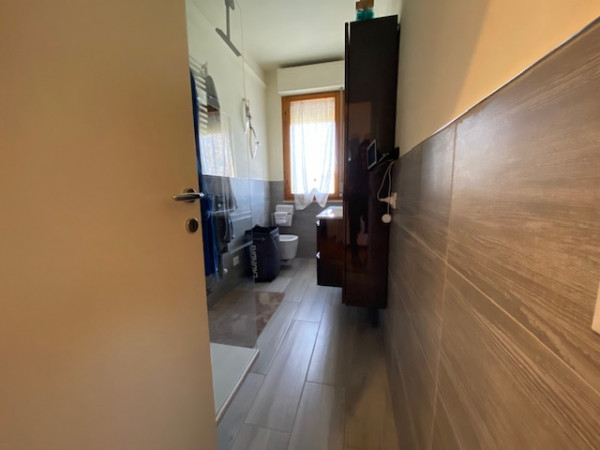 Ingrandisci la foto