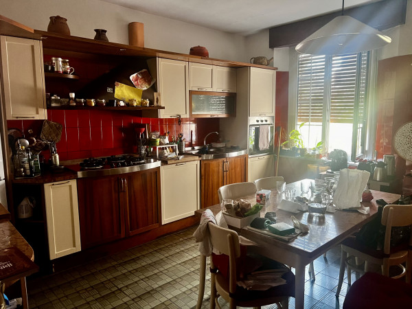 Ingrandisci la foto