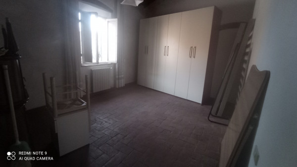 Ingrandisci la foto
