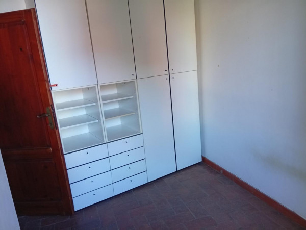 Ingrandisci la foto