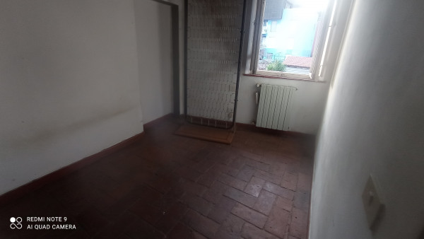 Ingrandisci la foto