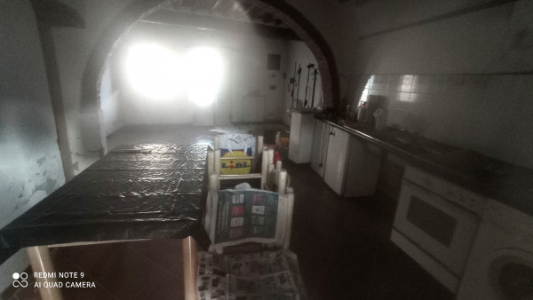 Ingrandisci la foto