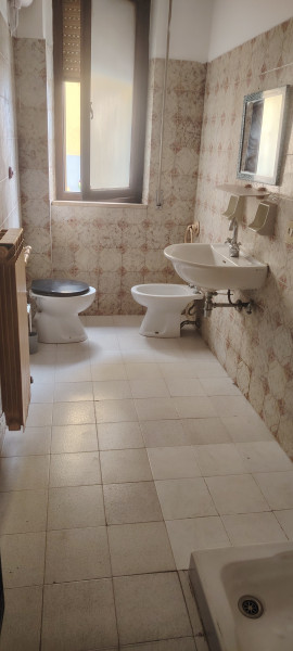 Ingrandisci la foto